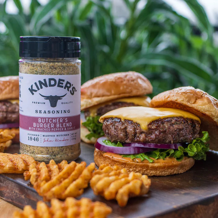 Kinder's Butcher's Burger Blend bottle served with cheeseburgers and waffle fries